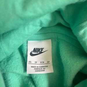 Teal cropped Nike sweatshirt